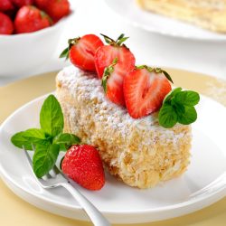 a-slice-of-napoleon-cake-with-strawberries-and-mint-layer-cake-with-cream-closeup-.jpg